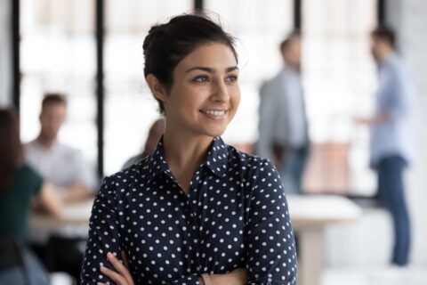 Confident smiling Indian female group leader looking at window with arms crossed. Team working in background. Successful young businesswoman dreaming of company or project future. Head shot SSUCv3H4sIAAAAAAAACpxTyW7cMAy9F+g/DHwOAe1LfqXogZLoGSMeO7DlFEGQf6+8jqfHXgTxkXzcv37+uFyqgGMTq9fL1ywVuWnbacwD5qbvCsxeNnygLtFwRj4GadgZoNTkfmiwPYMBc7x1eKcCdlPbzvD3oqzGjHkaaZyjb1DETNfCsYIHxZrir1W+7IpFWTyKqqpeTtg4hQXboZX8vzzXz++9GrxSFz8fuRUoDYT3MTdLhUeKRWH1EzUX4km2/oiy088BWrx//kP05GaC8FomC8I5AYppD4FJD0lYn5zkXIb0IF4/SxVbhwdqCdembzGqWmnLiBEwbqhQcgbIDQcynlvluQ/hSL0y6IJynCBJFkFFaQGtFFB7q/RMEDAextpK572KkBwxUDYV5pQ8OHJSBXIuSH4Yi5ACq7kHVVTlSQkw6AhGEdeChE6GHsxcRGesAyFMKDm7WNqgLJCMUvlaeJRH+6tgjOY6KojBW1DcETjDPIigZHLauVrg0rN1ENXbn0zD/byXOKWmP63kRx+xnQ3kqbXvQxOb7npy6/NtuZndLfZTl4d5vsdQq7bv3zG08/bUhZN2/IbjWMzTjp8CxXKh/f0Up+vzMtGNtUrljGaRS2Eks9ZLJZQyTrrNYD29W1N4lnR2oiLHtyadS2/mDCrDdNBoBBjCMiGHElzZNmBoow4U6zrWpYXffwEAAP//AwChVONWVQQAAA==