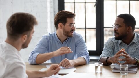 Diverse team discussing project strategy, sales and marketing reports on corporate meeting in office. Male leader and his group talking and brainstorming together. Coach training multiethnic employees SSUCv3H4sIAAAAAAAACpxTy2rkMBC8L+w/DDpHoKcl5VeWPejlGRGPFWQ5IYT8e9rPaPa4GIy7Wl1dXWp//v51uSBnp+TR8+VziSBOwzBPtdia8ggwedrxEscQS4u8Fd6RFogh1VySHVrQ2epvo71HAMd5GBb4a02iqdo6T3Fauu+QtzVegWMDT4pN4p8tvhyJNQkVkELoqcGm2a3YAW3k/1W5ffw9prHXOPqPH20AhRLtfappnfCUCAklH6gpYw+xMmeXg35pMNj7xz9ED2WdY0byoDDTmmFBpMGOcIMDUyZoTil34Yd4+1in2B0ucYh2M33vgaTi2hjhcdCRYKECwTYEg3XUXLioteP00ICYC4701GABKXiFgK2THnciUskik6GL52FJmded0pixzoFY7UGsUDhyz4XpmbFcrmI3B9DLe43l3i6EnUPKzS68ZW+H5QBvZnotyafx2pTleluX9SjzeR5rWYw93URDzq/WDcu19cAZD/xmpwmOhwNvGnn4NfK96TPmulq5s6IA+7uElLOOE6UMFwweTva733f+loBnlXMQQexfUmhHT4sC5B3vBZUELLQKC+87uBxGMaVWSdOD7YaBhV/fAAAA//8DANgeqNnOAwAA